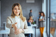 © Dragana Gordic - Happy office employee giving hand for shaking . Arm of business woman offering handshake. Professional welcoming colleague or new partner. HR manager hiring greeting at job interview. Close up shot