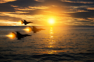 Wall Mural - Air Force Day. Aircraft silhouettes on background of sunset.