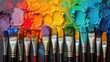 Array of paintbrushes with multicolored paint strokes on canvas.