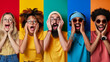 five individuals with various expressions of surprise and happiness are standing against a multicolored background