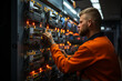 © Zelma - Electrician man installing electric switchboard system, professional in work process