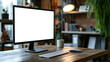 © DimaSabaka - Computer mockup with blank white screen on the table