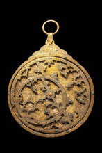Beautiful Antique Astrolabe, Ancient Astronomical Instrument Isolated On Black Background
