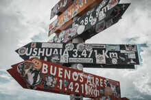 Signs With Directions Around The World From Argentina