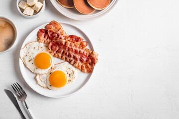 Poster - Breakfast with fried eggs, bacon and pancakes