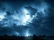 Lightning thunderstorm flash over the night sky
