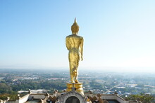 Large, Golden, Spinning Buddha Statue Standing In A Temple On A Hill Is A Landmark Of Nan Province, Thailand.