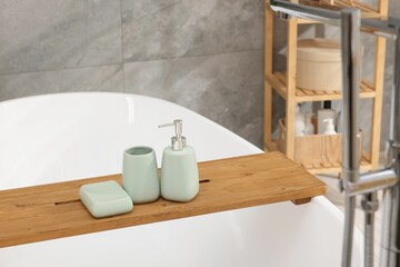 Canvas Print - Set of bath accessories on tub in bathroom