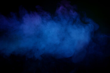 Blue and green steam on a black background.