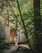 Tranquil visitor in white robe approaching forest infrared sauna, natural wellness retreat