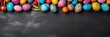 Charcoal background with colorful easter eggs round frame texture