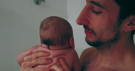 Wall Mural - Father and baby son in shower bath