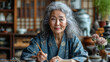 Mature Asian Woman Painting Ceramics. Generative AI