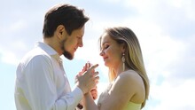 Man Kiss Hands Of Happy Girl At Sunny Day, Slow Motion, Sky In Frame