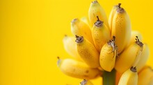 Fresh Ripe Bananas Bunch On Vivid Yellow Background. Eye-catching Fruit Display With Minimalist Style. Ideal For Healthy Lifestyle Promotion. AI