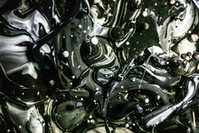A Monochromatic Palette Of Black And Gray Swirls With Scattered Bubbles Creates A Sleek And Modern Abstract Design