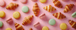 French Patisserie sweet Pattern. Croissants and macarons on simple background, wallpaper for baking goods or pastry shop, top view.