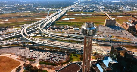 Canvas Print - Approaching the spherical top of Reunion Tower and Margaret McDermott Bridge with lively traffic. Aerial view on Dallas, Texas, USA on sunny day.