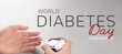 World Diabetes Day. Man checking blood sugar level with digital glucometer at grey table, closeup. Banner design