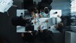 © Summit Art Creations - Top down aerial view of business people discussing about financial strategy on table with document and tablet display investment statistic at meeting. Diverse team brainstorm about plan. Directorate.