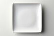 © Jawad - Top view of empty square plate isolated on white