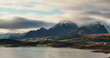 Lofoten's Majestic Mountains Overlooking a Serene Village