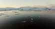 Arctic Archipelago: Drone View of Norway's Frozen Isles at Dusk