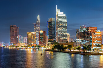 Canvas Print - Ho Chi Minh City skyline, Vietnam. Night view of skyscrapers