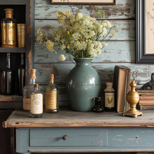 Vintage Decor Bottles And Vases On Grungy Table And Wall.
