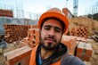 selfie of worker with hard hat in front of bricklaying work