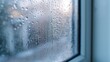 Close-up of double-glazed window condensation caused by excessive moisture in the house in winter occurs when the seal between panes is broken or desiccant inside the window. 
