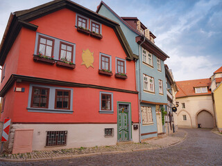 spring trip to Europe. Travel and German sightseeing locations. scenic view to facade of old historic houses somewhere in Erfurt city, Traditional half-timbered houses makes cozy and fairy tail mood