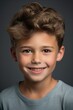 © Fotograf - A young boy with a big smile on his face. Perfect for capturing joy and happiness in everyday life