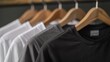 A row of shirts hanging on a rack. Suitable for fashion or retail concept