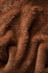 Wall Mural - Texture of a brown faux fur as a background.