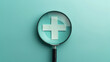 .A minimalistic representation of a single magnifying glass focusing on a medical cross symbol