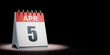 April 5 Calendar Spotlighted on Black Background