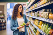 Woman choosing fruits in grocery store
