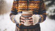 Person in a rustic sweater holding a vintage mug, soft focus on a gentle snowfall in the background