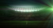 A stadium is illuminated under bright lights, with copy space