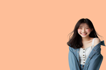 Asian girl standing and laughing happily  background