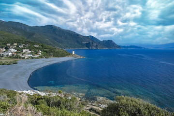 Wall Mural - Corsica, the Nonza beach, with black pebble