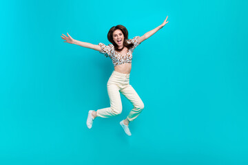 Poster - Full length photo of sweet impressed woman wear flower print top jumping high arms sides isolated teal color background