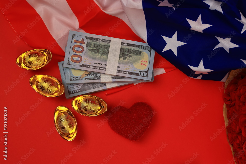 American flag with cash us dollar and golden ingot with heart shape in ...