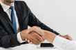 © Vittaya_25 - Partnership. two business people shaking hand after business signing contract in meeting room at company office, job interview, investor, success, negotiation, partnership, teamwork, financial concept