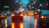 Fototapeta Sport - Traffic on city streets at dusk in the rain, blurr.