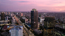 Panoramic Cityscape Of Indonesia Capital City Jakarta At Sunset. A Rare Clear Day In The Polluted City.
