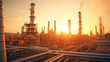 © BlazingDesigns - Oil and gas refinery plant or petrochemical industry on sky sunset background. Manufacturing of petrochemical industrial.