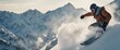 © abu - Snowboarder jumps off a ramp in the snowy mountains, snowflakes fly behind him
