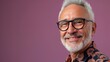 © iuricazac - Smiling man with white beard wearing glasses and patterned shirt against purple background.
